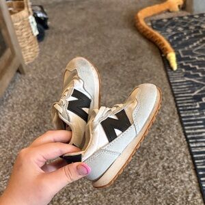 New Balance Kids Cream and Black Sneakers